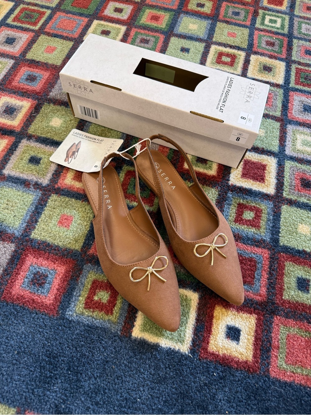 Serra Tan Pointed Toe Slingback Flats with Gold Bow Accent